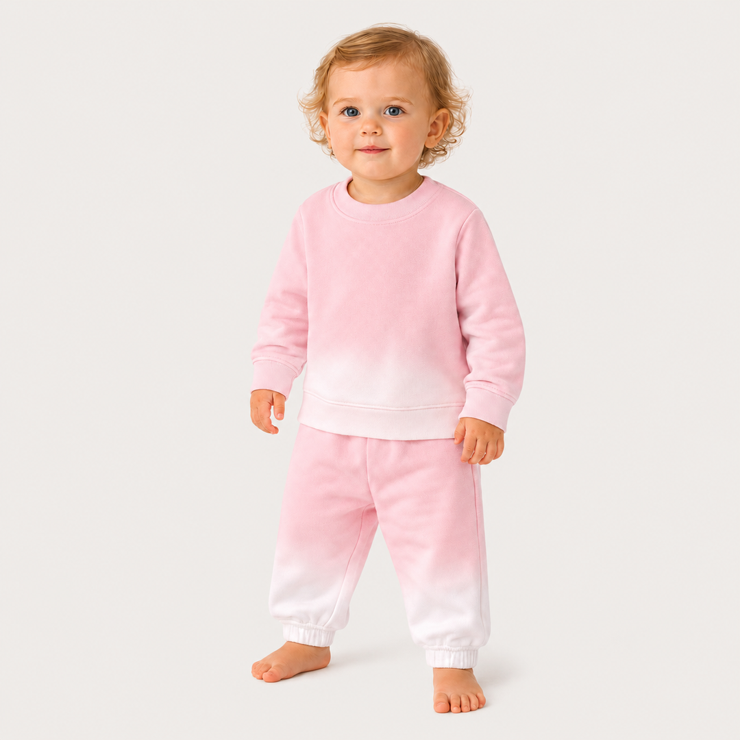 Baby wearing the PAIGELAUREN Ombre Pink Dip Dye Fleece Sweatshirt and Sweatpant Set