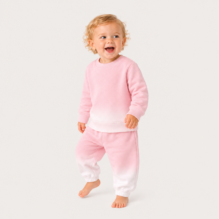 oddler wearing the PAIGELAUREN Ombre Pink Dip Dye Fleece Sweatshirt and Sweatpant Set