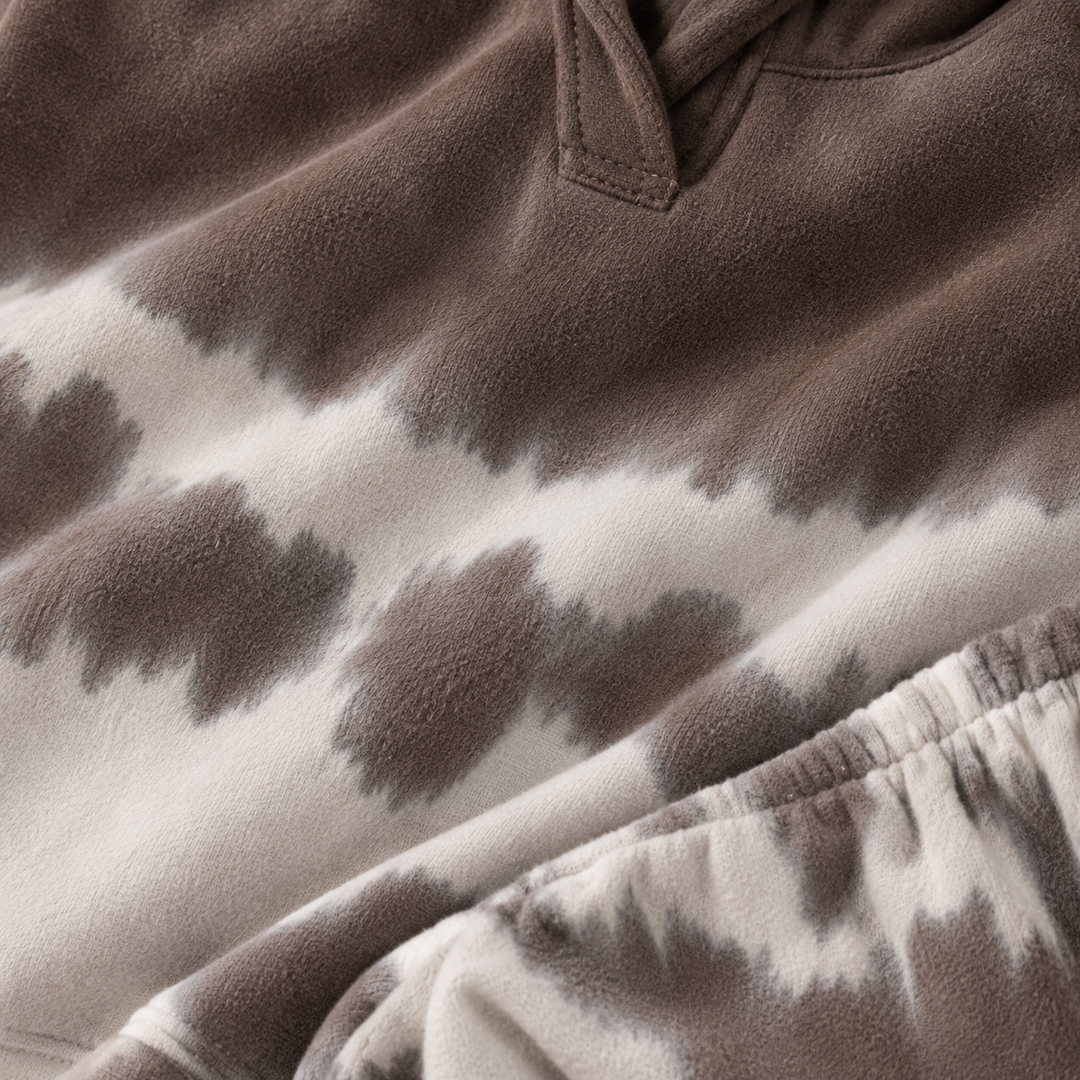 Close-up of PAIGELAUREN Brown Tie Dye fleece fabric and hand-dyed detail