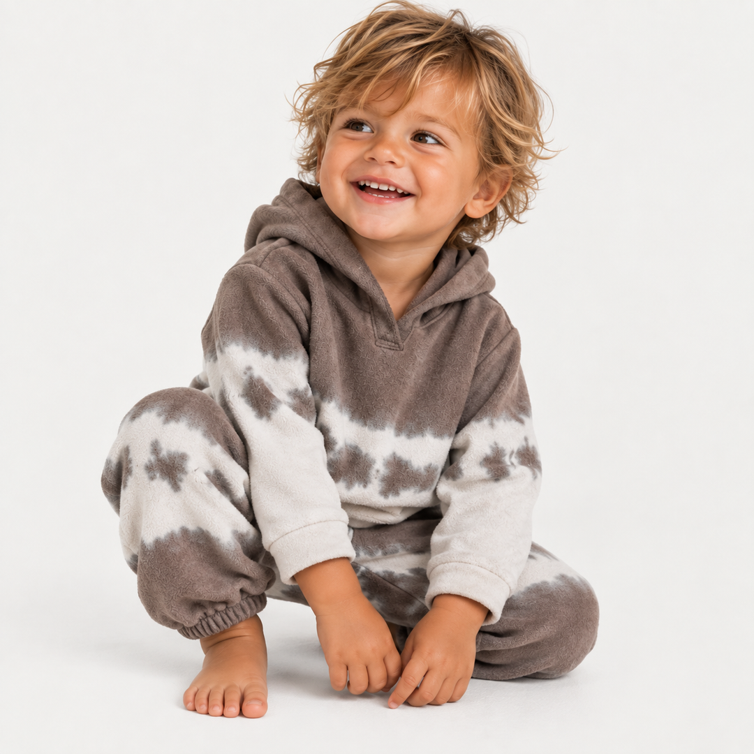 Toddler wearing PAIGELAUREN Fleece Dip Dye Hoodie Loungewear Set in Brown Tie Dye