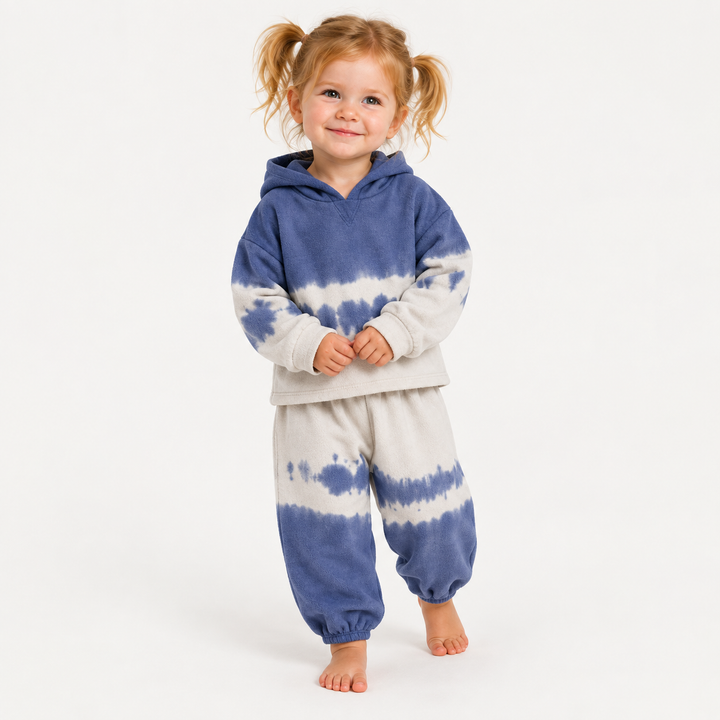 Toddler wearing PAIGELAUREN Fleece Dip Dye Hoodie Loungewear Set in Navy Tie Dye