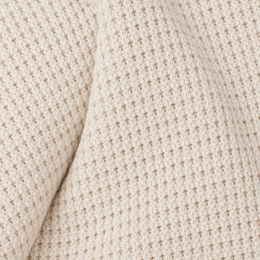 Close-up of PAIGELAUREN Bone garment-dyed thermal fabric texture