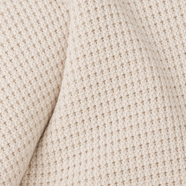 Close-up of PAIGELAUREN Bone garment-dyed thermal fabric texture