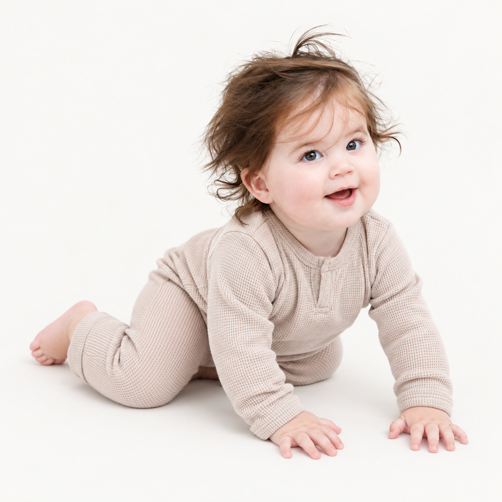 Baby wearing PAIGELAUREN Garment Dyed Thermal Henley Tee and Legging Set in Bone