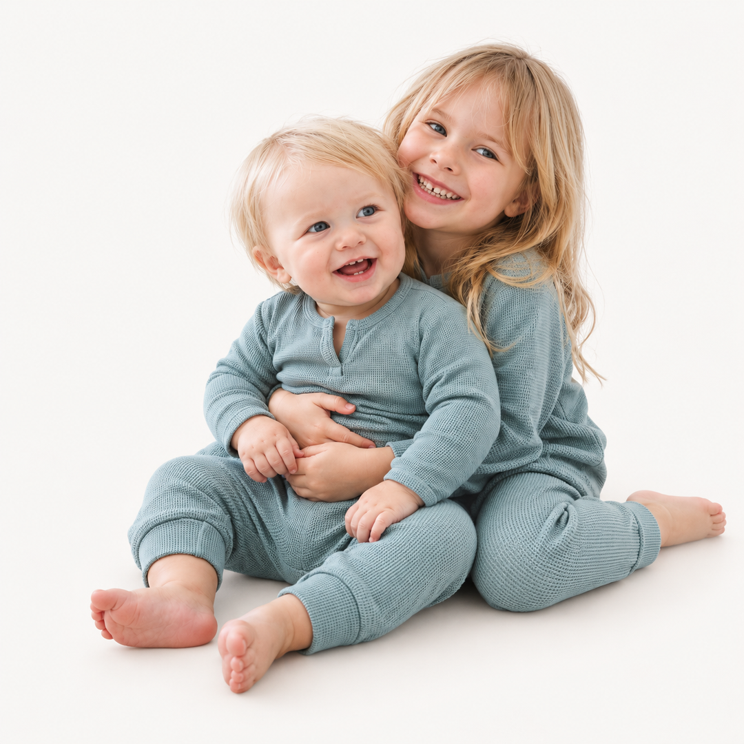Baby and Toddler wearing PAIGELAUREN Garment Dyed Thermal Henley Tee and Legging Set in Sage