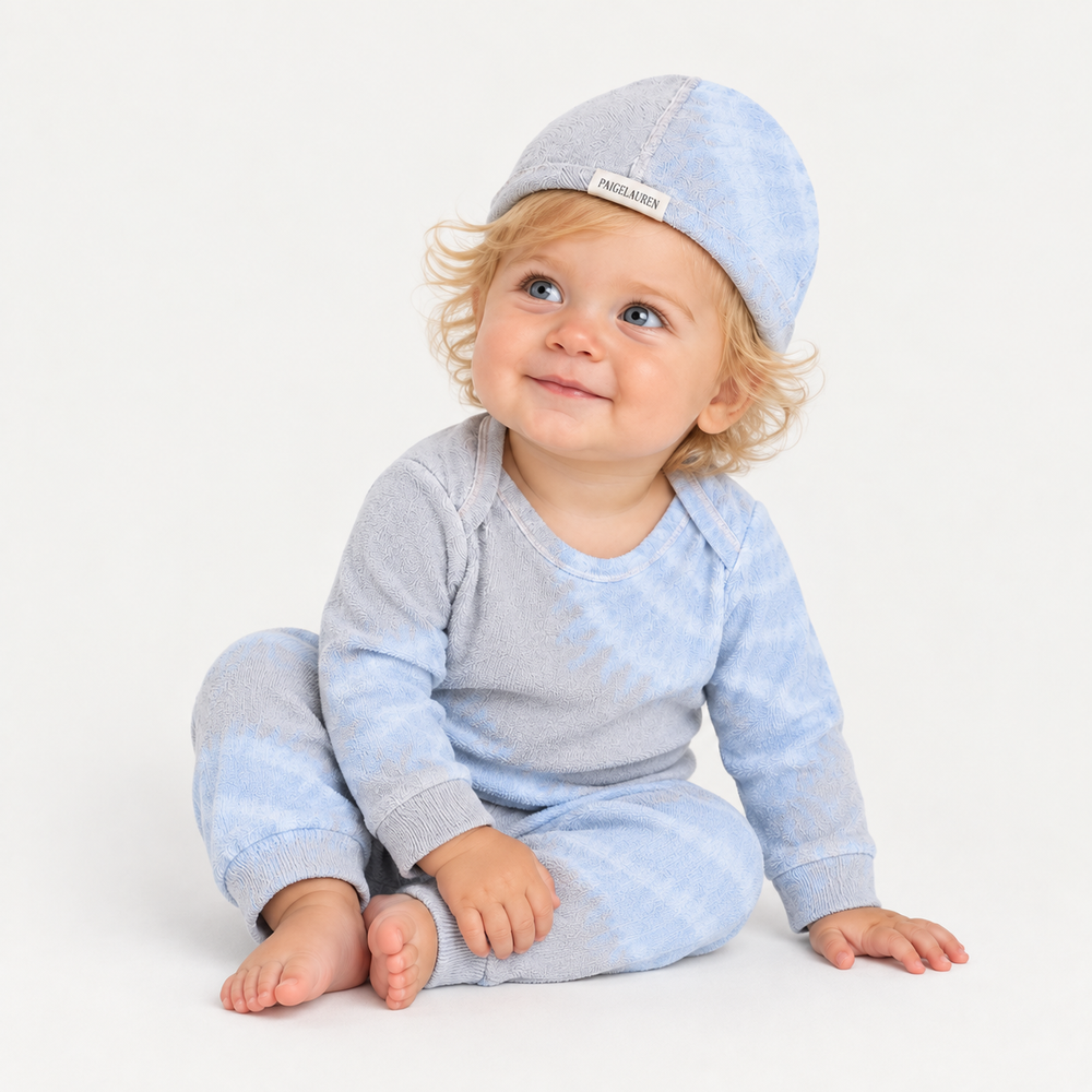 Baby wearing PAIGELAUREN Gray Blue Tie Dye Ribbed Beanie, Lap Tee and Legging Set