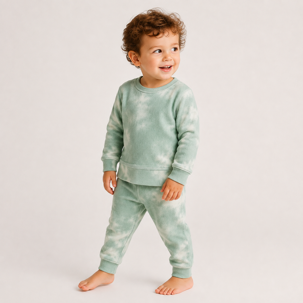 Toddler wearing PAIGELAUREN Brushed Hacci Green Tie Dye Pullover and Pant Set