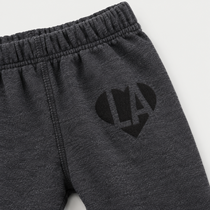 PAIGELAUREN Heathered Black fleece sweatpant with black puffed LA heart graphic