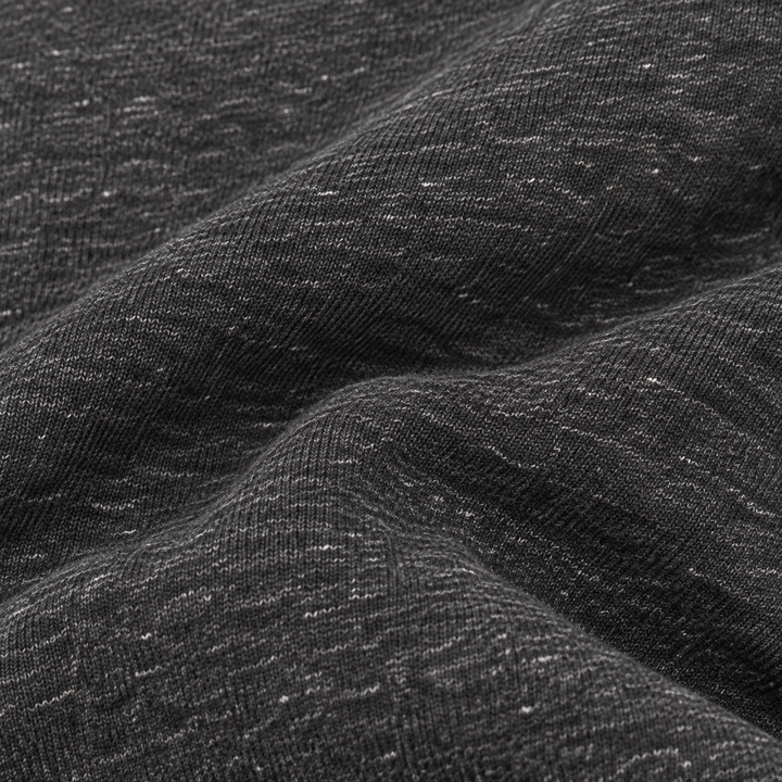 Close-up of soft Heathered Charcoal Vintage Fleece fabric by PAIGELAUREN