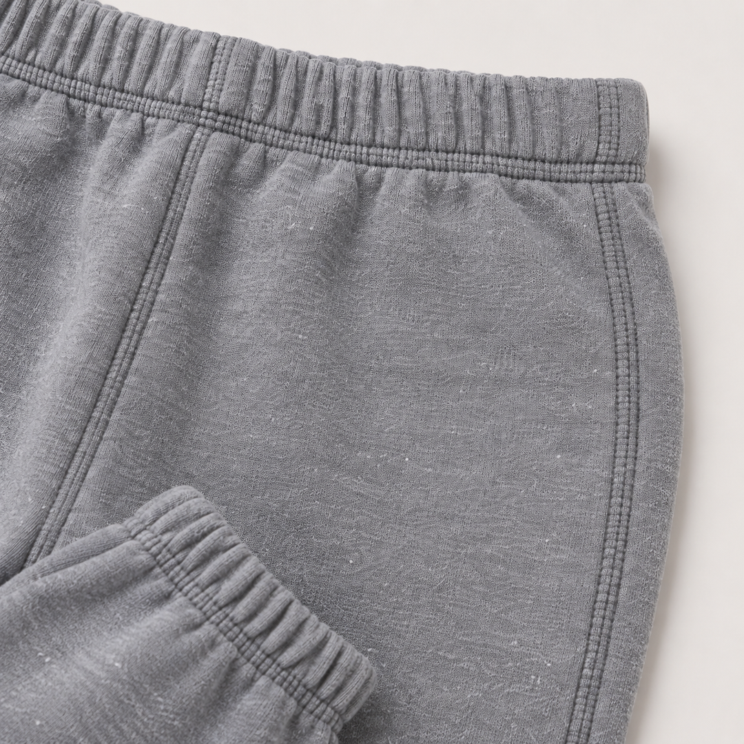 Close-up of PAIGELAUREN Heathered Gray fleece pant with tonal topstitching