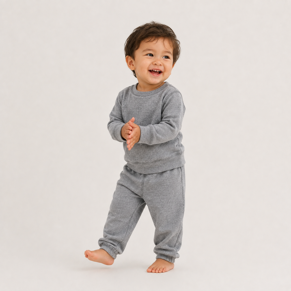 Toddler wearing PAIGELAUREN Heathered Gray Fleece Sweatshirt and Pant Set