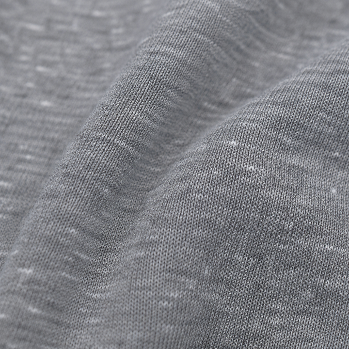 Close-up of PAIGELAUREN Heathered Gray tri-blend fleece fabric