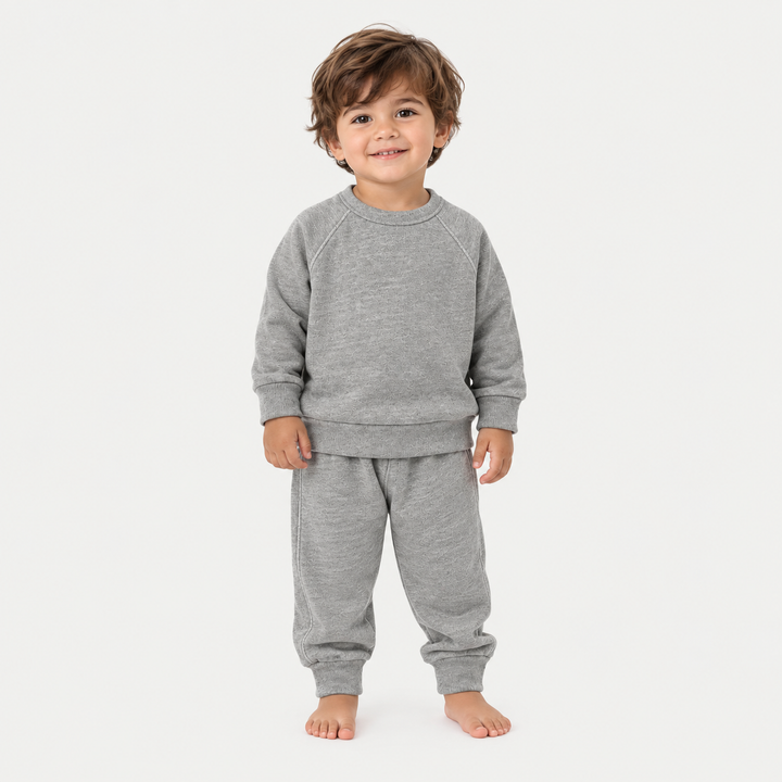 Toddler wearing PAIGELAUREN Heathered Gray Vintage Sherpa Sweatshirt and Sweatpant Set
