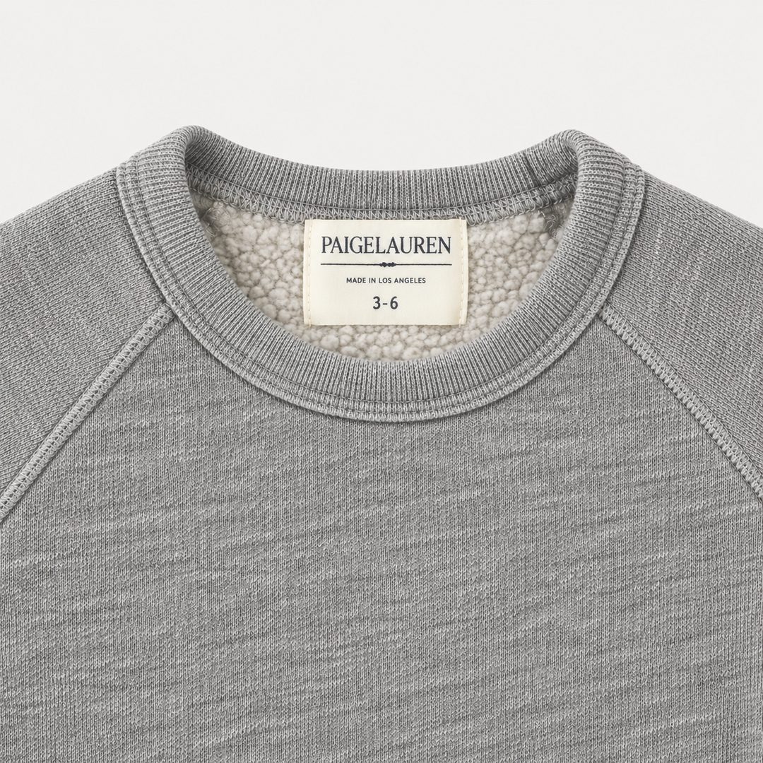 Heathered Gray Vintage Sherpa sweatshirt neckline, raglan seams and triangle detail