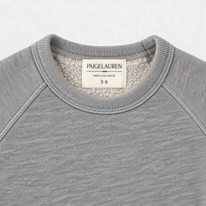 Heathered Gray Vintage Sherpa sweatshirt neckline, raglan seams and triangle detail