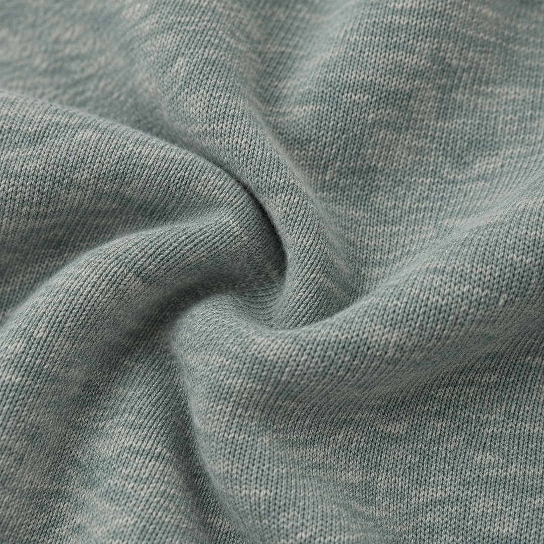 Close-up of PAIGELAUREN Heathered Green Vintage Sherpa fabric