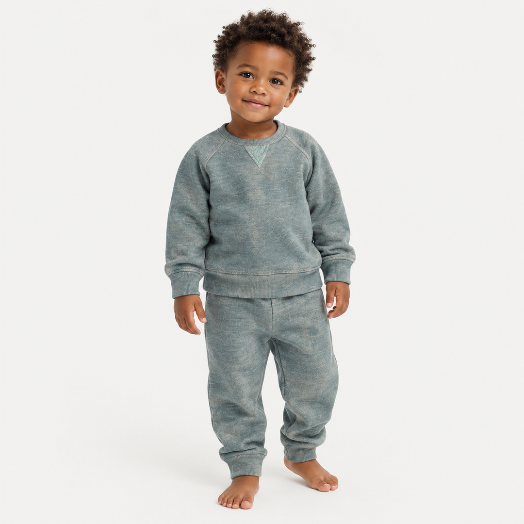Toddler wearing PAIGELAUREN Heathered Green Vintage Sherpa Sweatshirt and Sweatpant Set