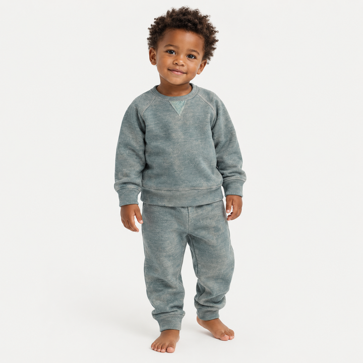 Toddler wearing PAIGELAUREN Heathered Green Vintage Sherpa Sweatshirt and Sweatpant Set