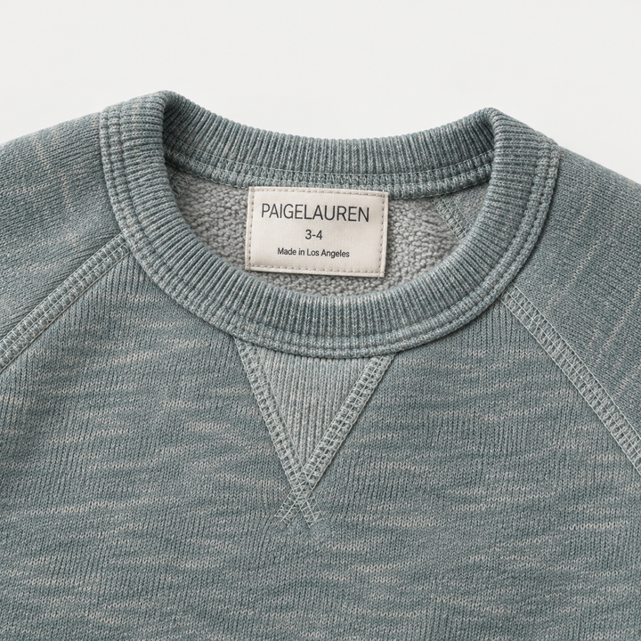Heathered Green Vintage Sherpa sweatshirt neckline, raglan seams and triangle detail