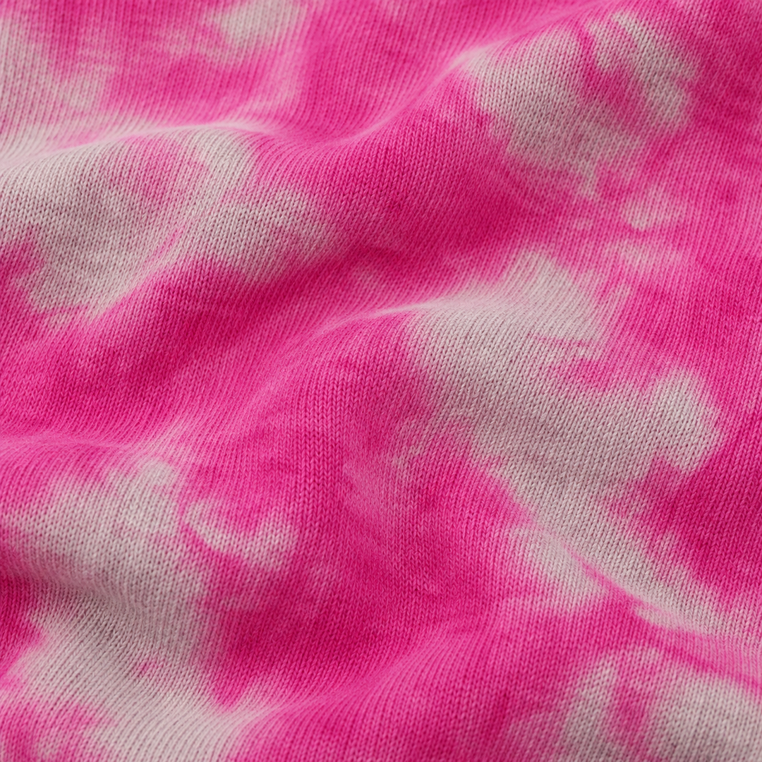Close-up of PAIGELAUREN Pink Heathered Marble Fleece fabric