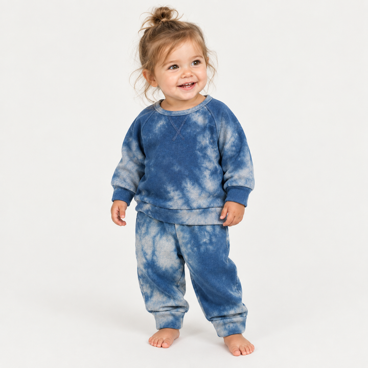 Toddler wearing PAIGELAUREN Blue Heathered Marble Fleece Sweatshirt + Sweatpant Set
