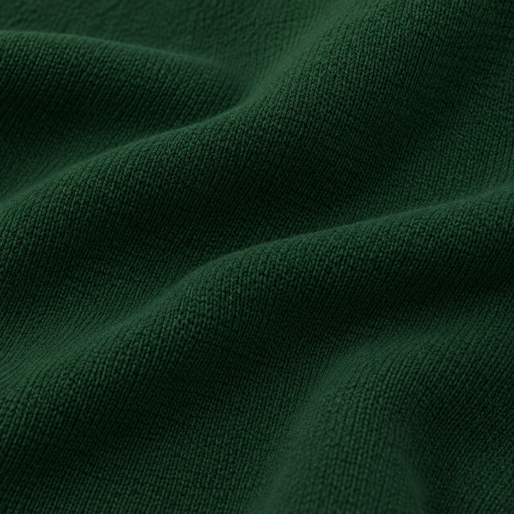 Close-up of soft PAIGELAUREN Hunter Green fleece fabric