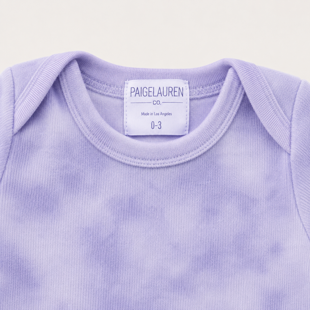 Close-up of ultra-soft Lavender Marble brushed hacci fabric with fuzzy texture