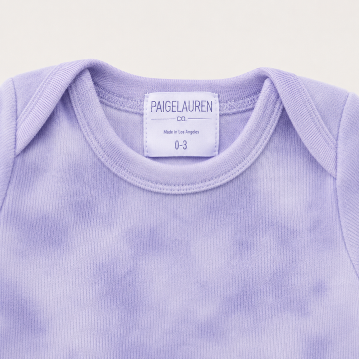 Close-up of ultra-soft Lavender Marble brushed hacci fabric with fuzzy texture