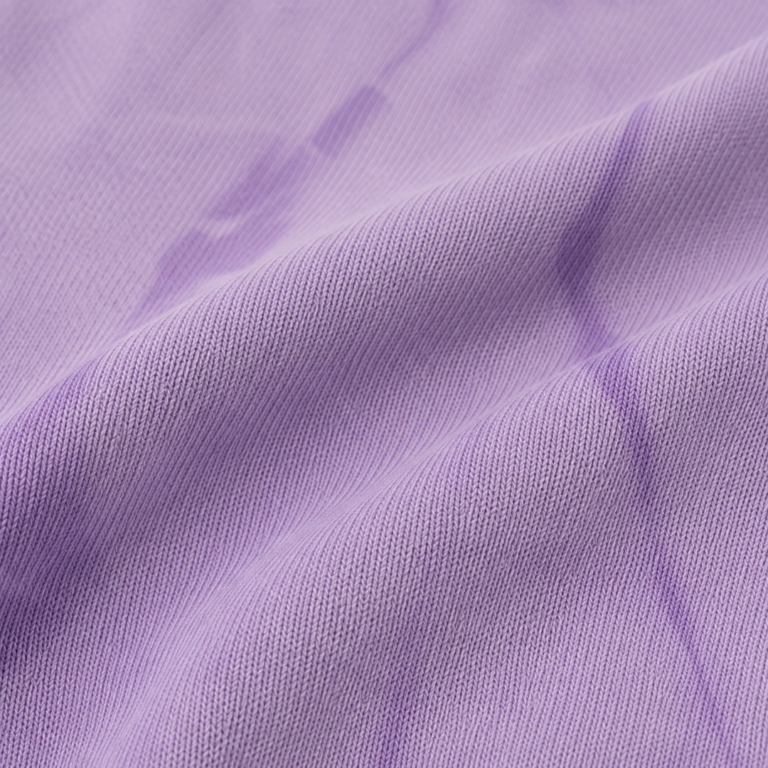 Close-up of PAIGELAUREN Lavender Tonal Dye super-soft fleece fabric