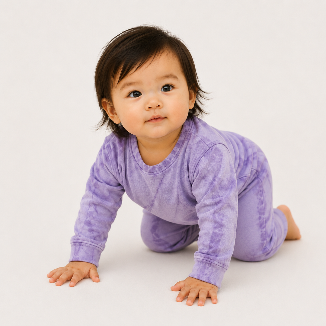 Baby wearing PAIGELAUREN Lavender Tonal Dye Fleece Loungewear Set