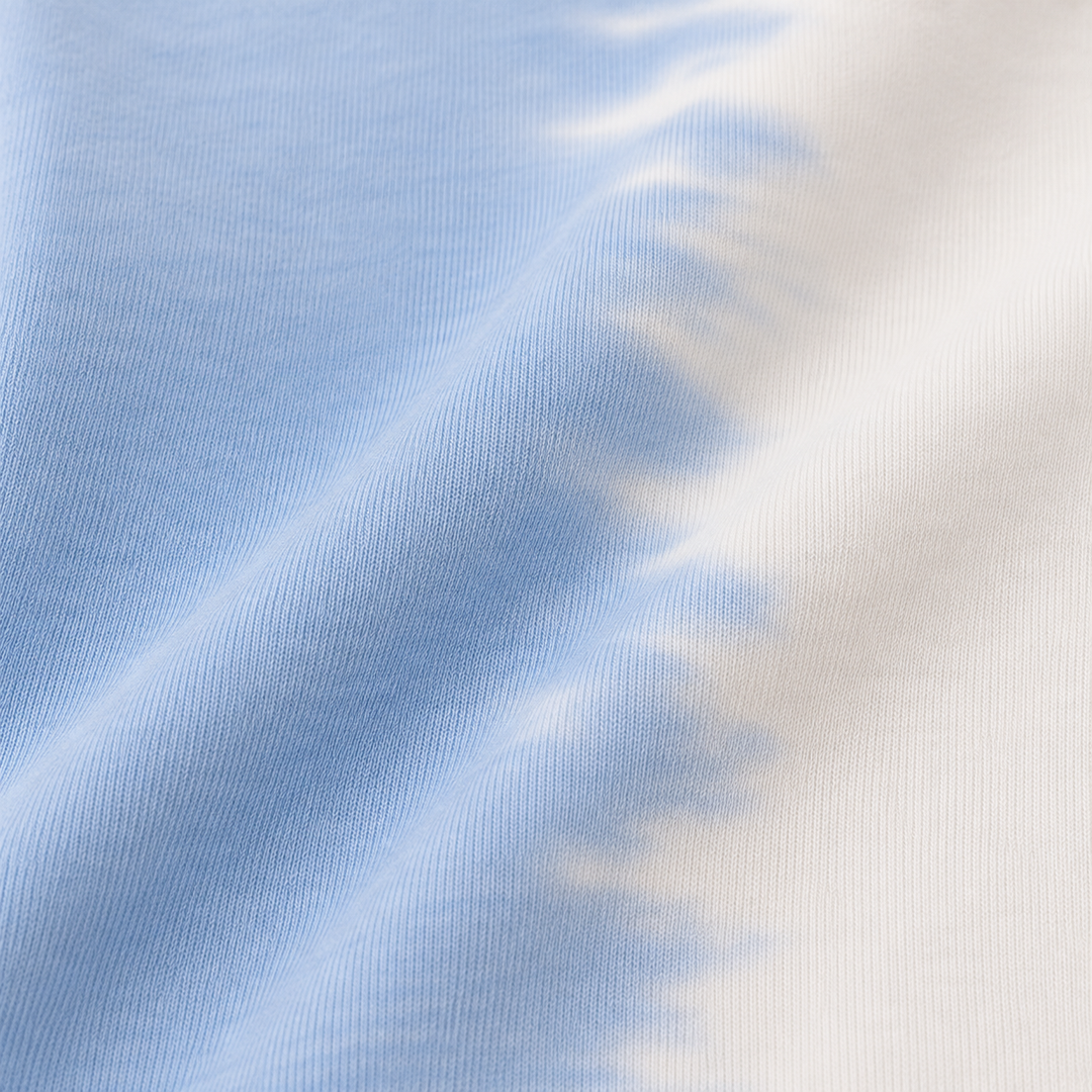 Close-up of PAIGELAUREN super soft fleece and hand-dyed Light Blue Tie Dye finish
