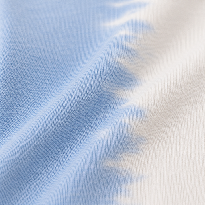Close-up of PAIGELAUREN super soft fleece and hand-dyed Light Blue Tie Dye finish