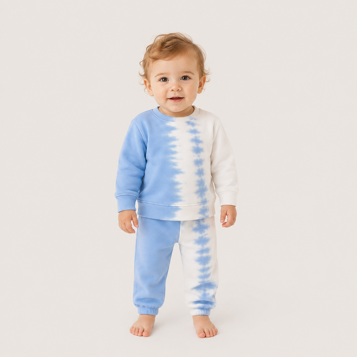 Toddler wearing the PAIGELAUREN Super Soft Fleece Tie Dye Set in Light Blue Tie Dye