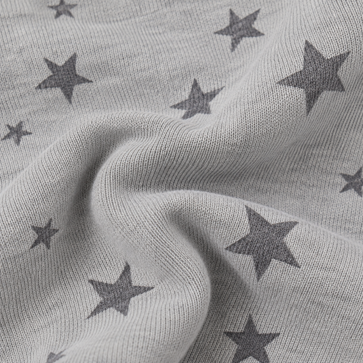 Close-up of PAIGELAUREN Light Gray Fleece with allover charcoal star print
