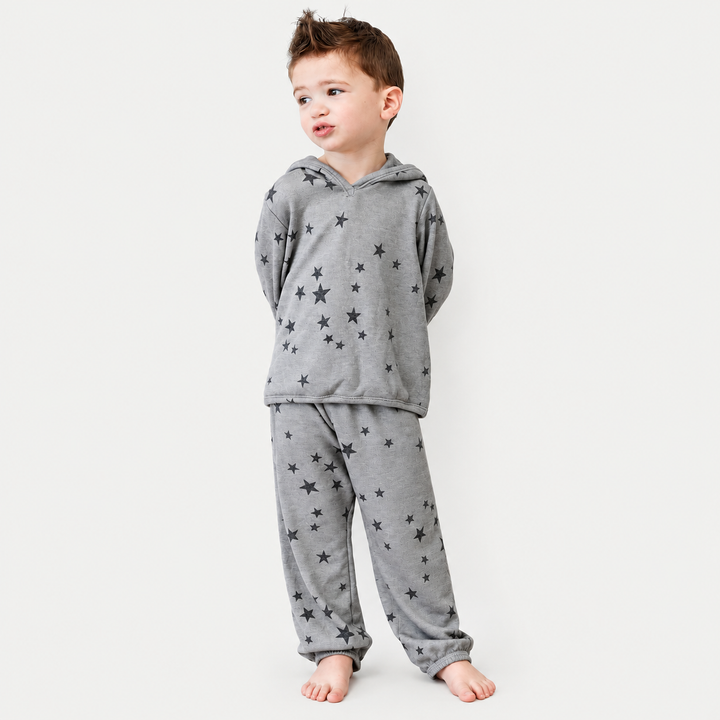Boy wearing PAIGELAUREN Light Gray Star Fleece Hoodie with hood up and matching Baggy Pant