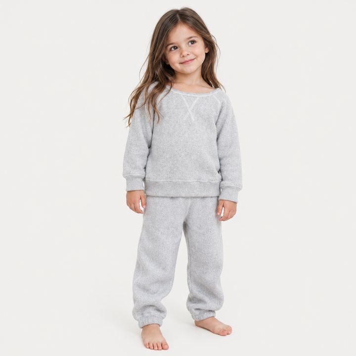 Girl wearing PAIGELAUREN Light Heather Gray Brushed Fleece Boatneck Sweatshirt and Sweatpant Set