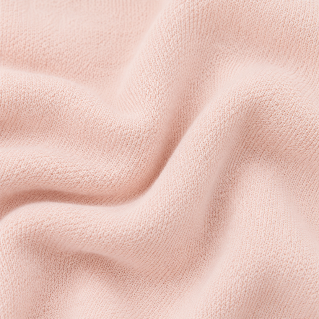 Close-up of soft PAIGELAUREN Light Pink fleece fabric