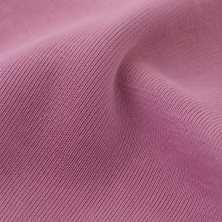Close-up of soft lightweight Pink hacci knit fabric
