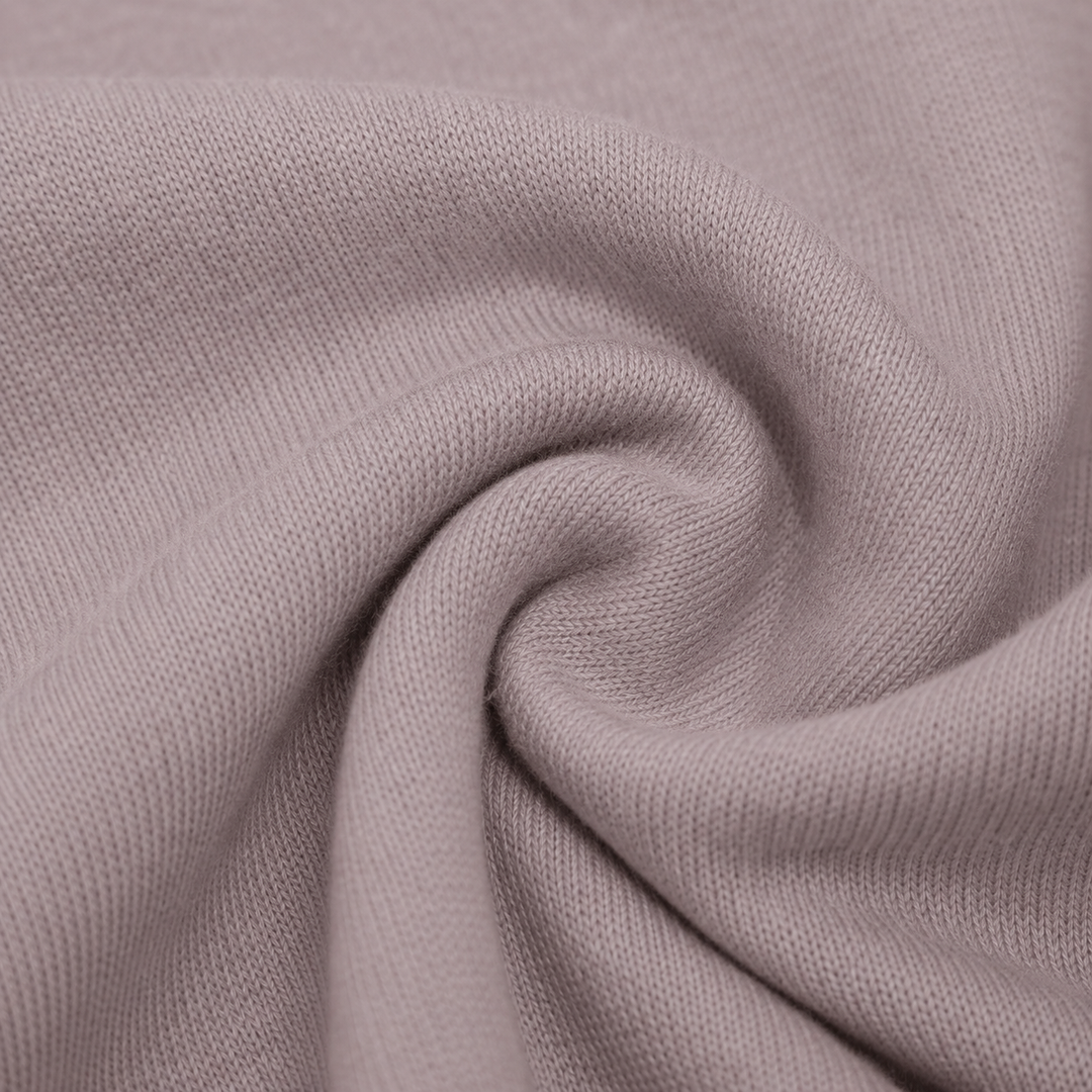 Close-up of soft lightweight hacci knit fabric in Taupe