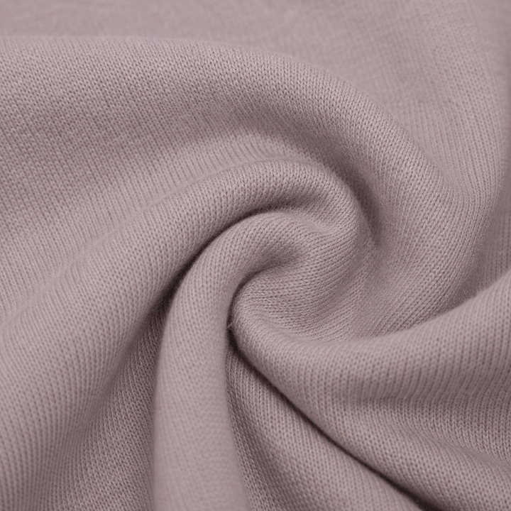Close-up of soft lightweight hacci knit fabric in Taupe
