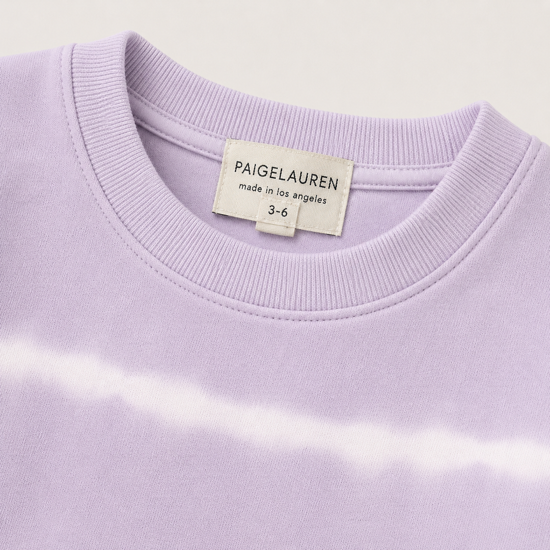 PAIGELAUREN Lilac Hand Dyed Stripe Rib Pullover neck and label detail