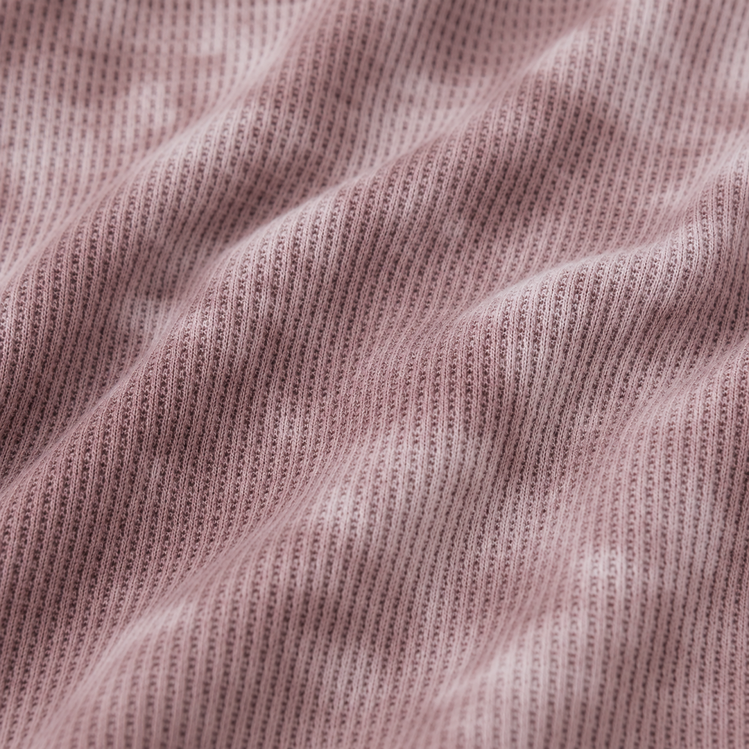 Close-up of PAIGELAUREN Marble Brown hand-dyed thermal knit fabric texture