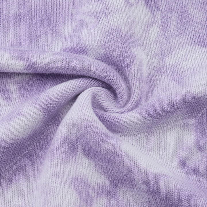 Close-up of fuzzy lavender marble brushed hacci fabric by PAIGELAUREN
