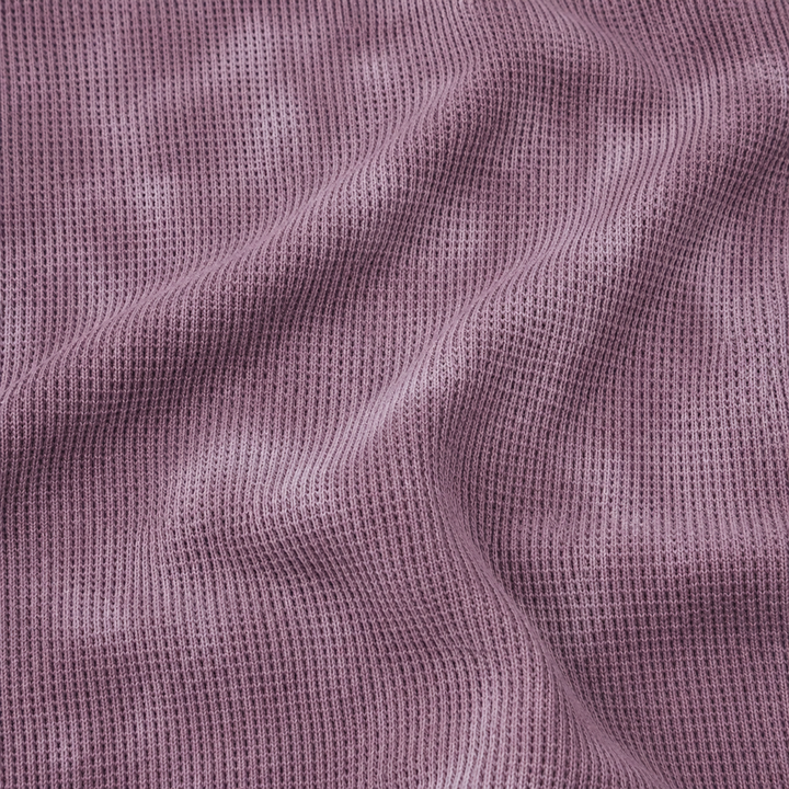 Close-up of PAIGELAUREN Marble Plum hand-dyed thermal knit fabric texture
