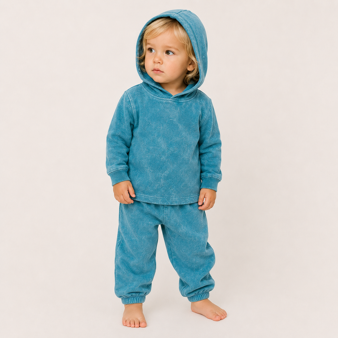 Toddler wearing PAIGELAUREN Mineral Aqua Rib Hoodie & Baggy Pant Set with hood up