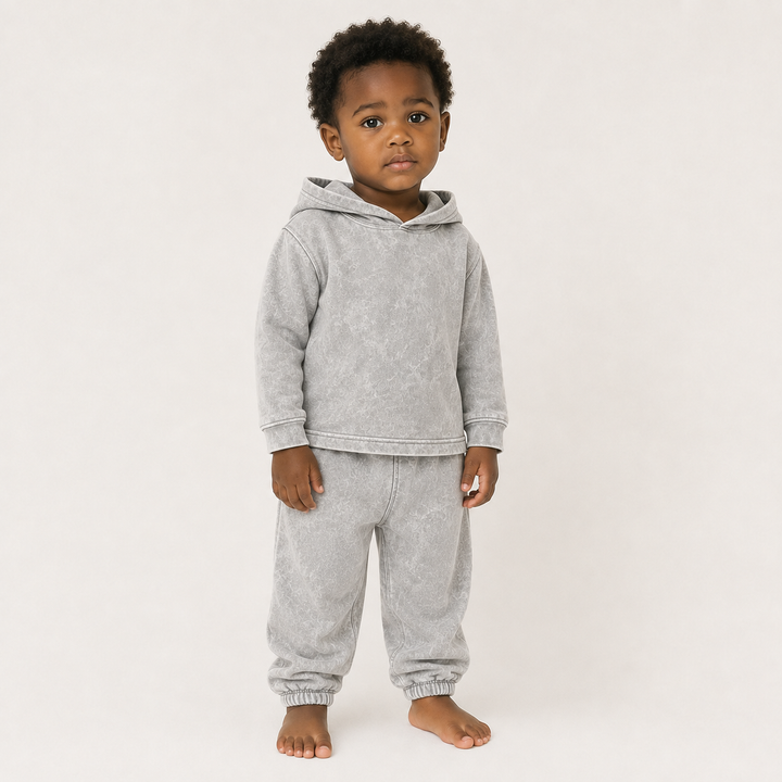 Toddler wearing PAIGELAUREN Mineral Gray Rib Hoodie & Baggy Pant Set with hood down