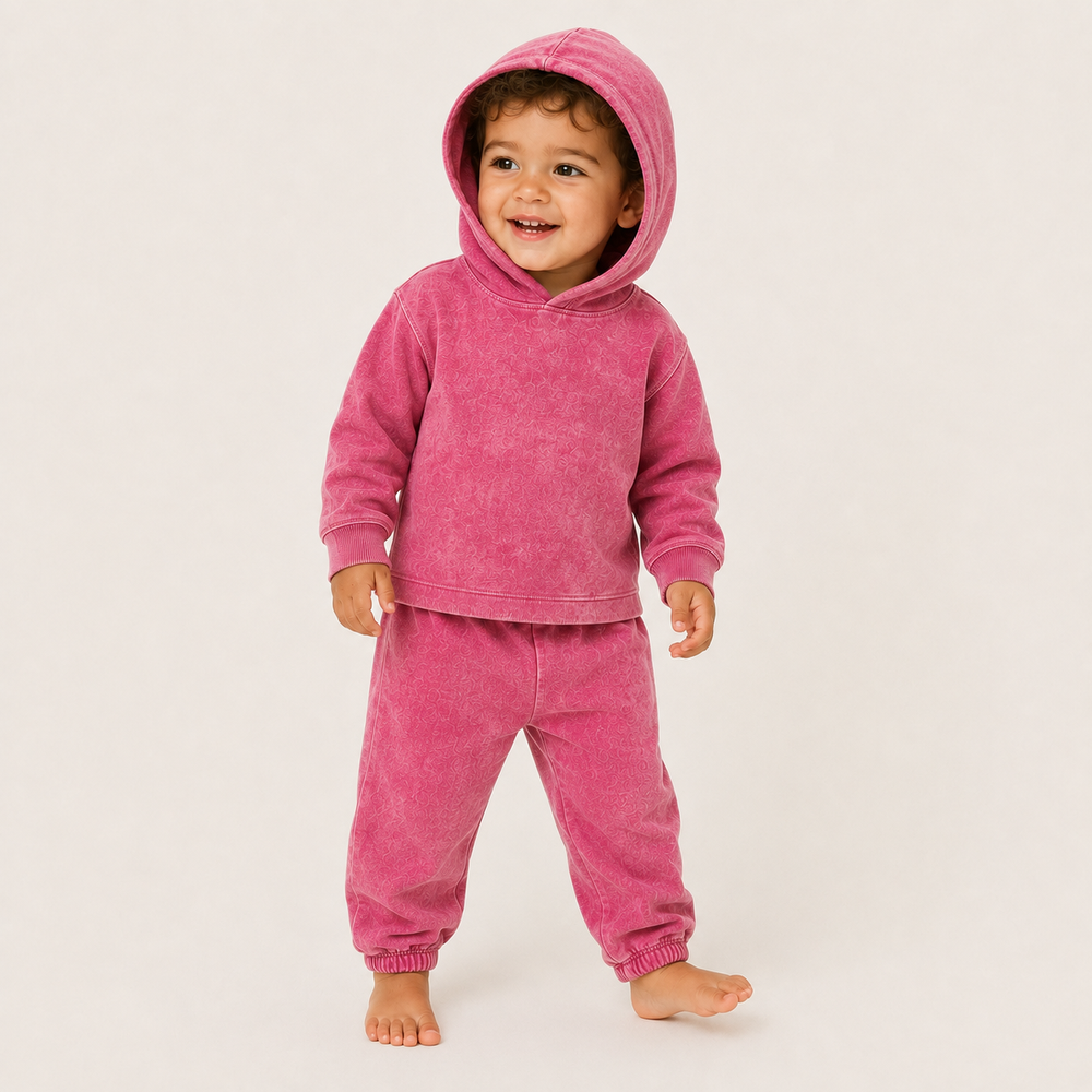 toddler wearing PAIGELAUREN Mineral Magenta Rib Hoodie & Baggy Pant Set with hood up