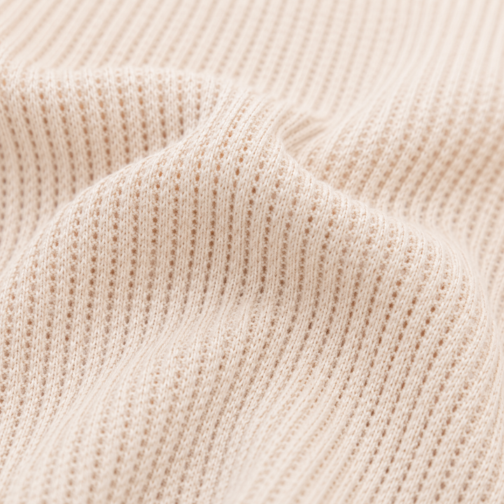 Close-up of PAIGELAUREN soft mineral wash thermal fabric in Bone
