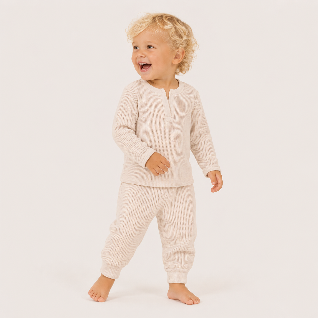 Toddler wearing PAIGELAUREN Mineral Wash Thermal Henley Long John Set in Bone