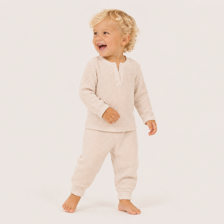 Toddler wearing PAIGELAUREN Mineral Wash Thermal Henley Long John Set in Bone